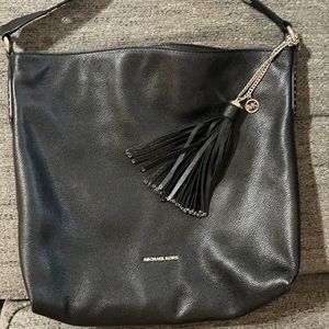Michael kors black hobo bag with silver accent